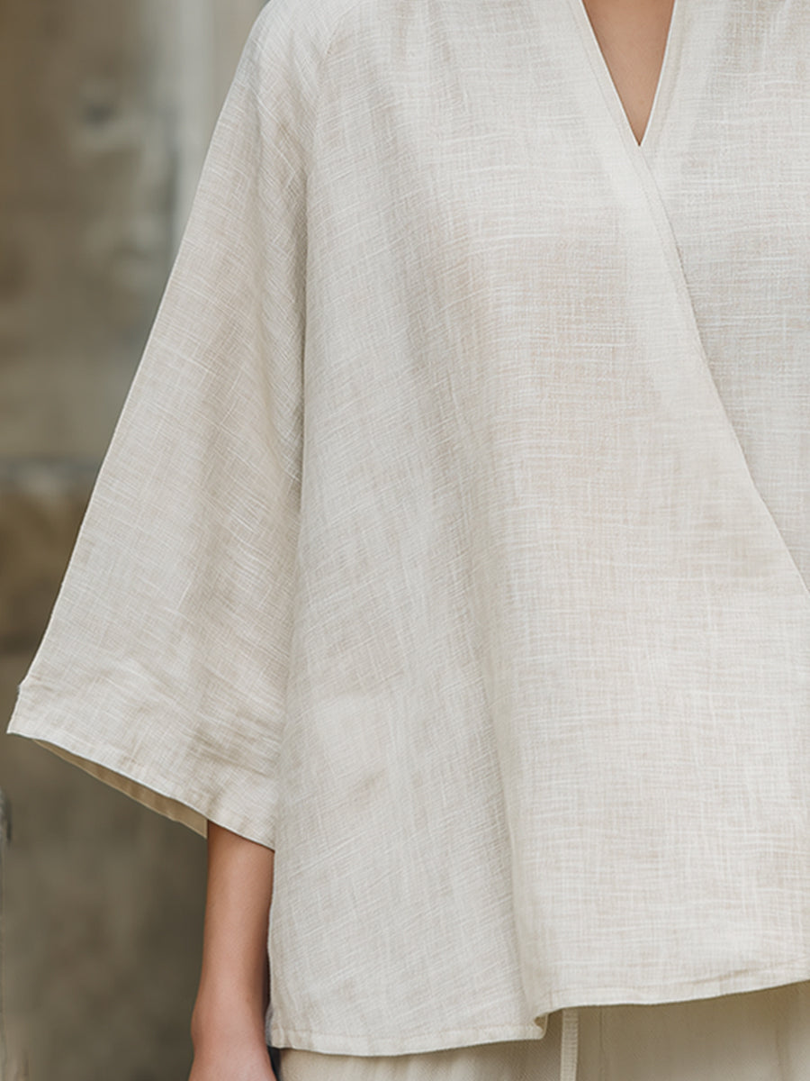 Ósamhverfur toppur úr líni með umslagi að framan 