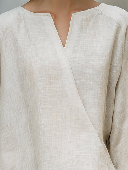 Ósamhverfur toppur úr líni með umslagi að framan 